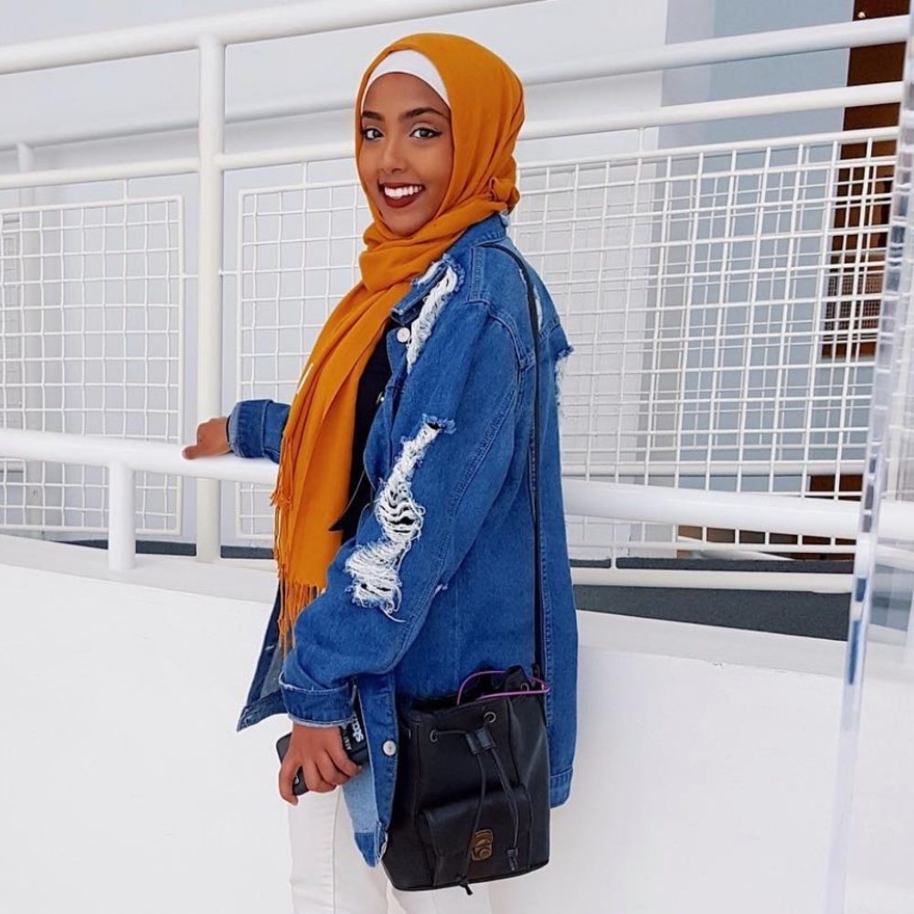 Distressed long denim jacket